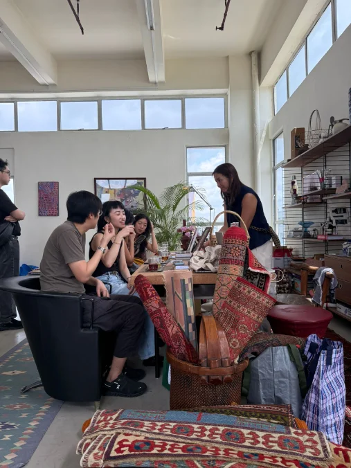Guests gathered around the table at a Teasan tea tasting event